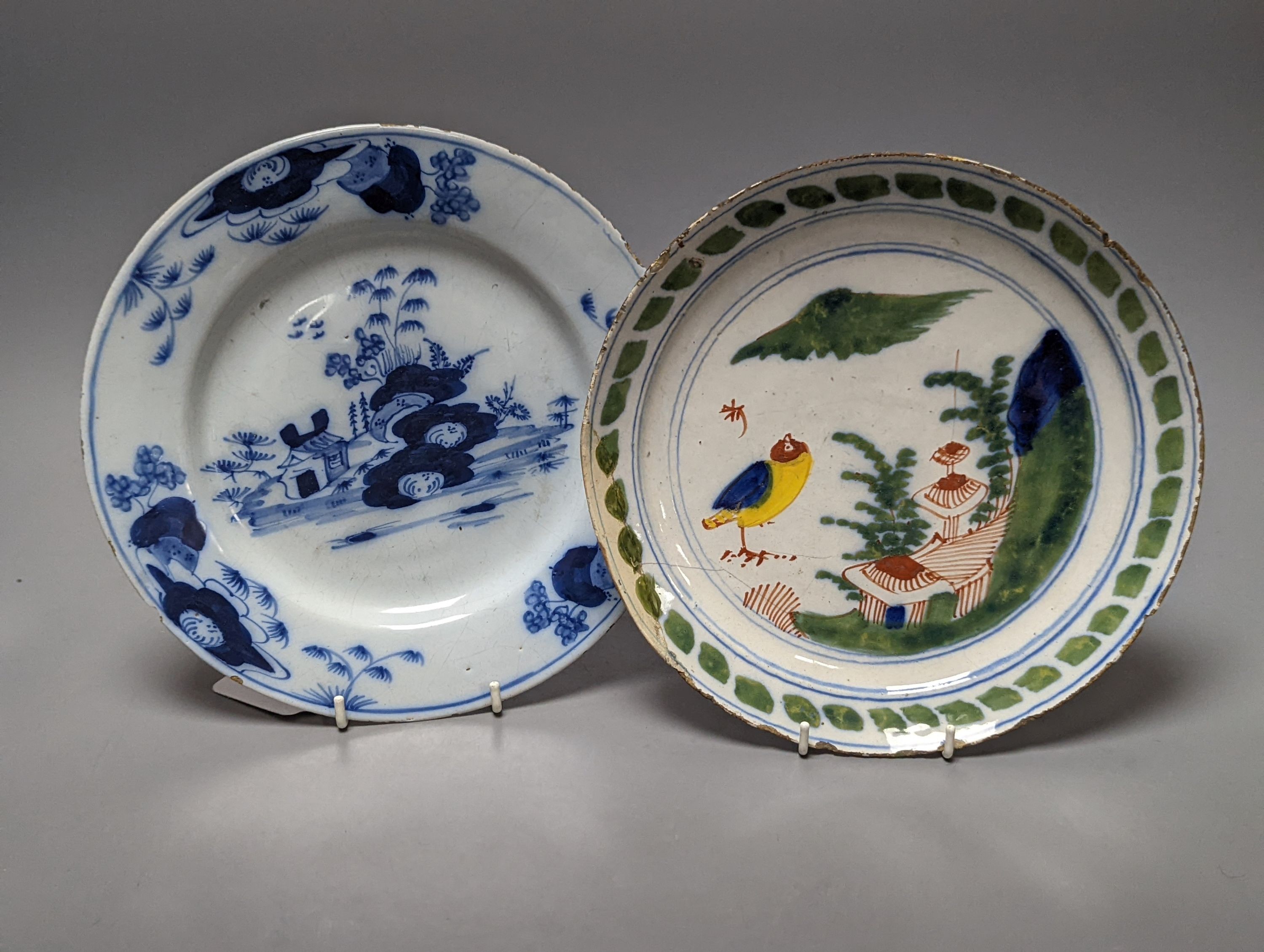 Seven English and Dutch delftware plates and dishes, c.1700-1760, 22 - 23cm, some damage